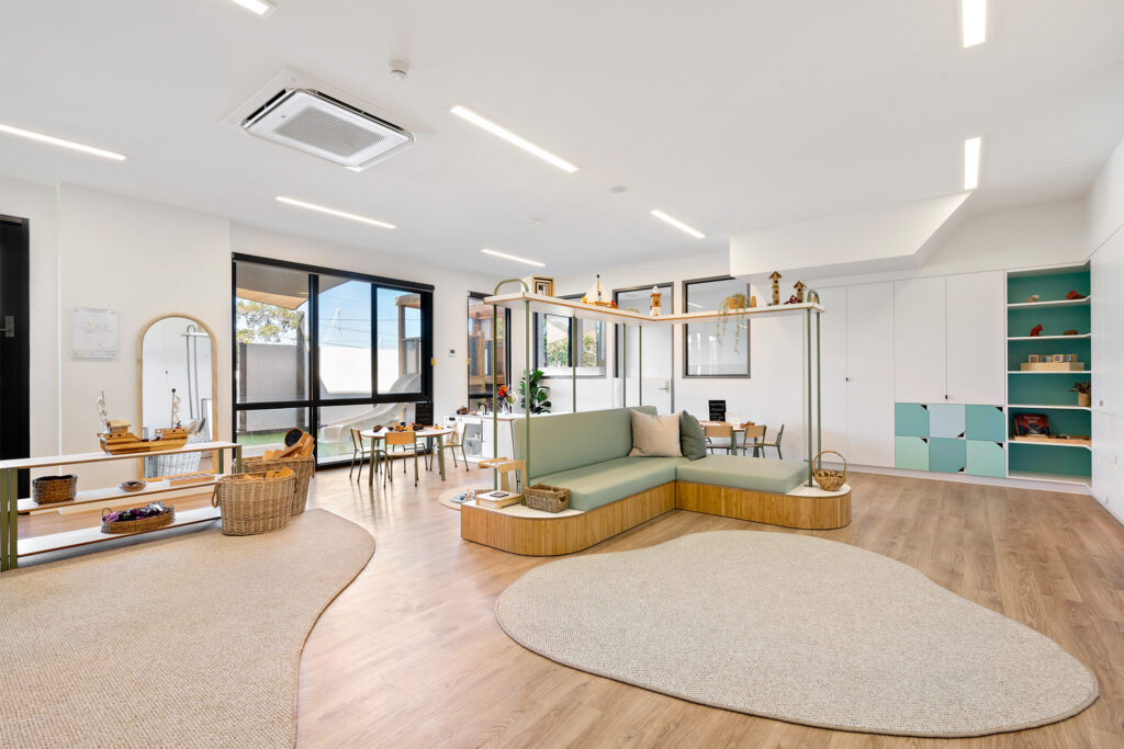A Elegant living room space with sofas at Nido Bulleen childcare centre