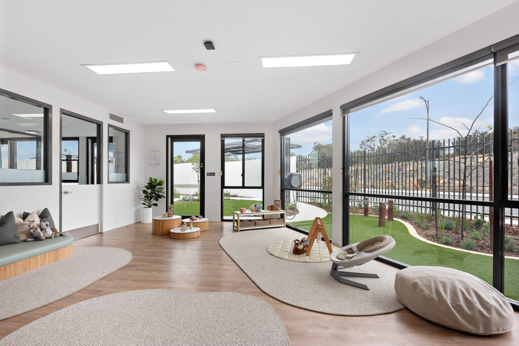 A Elegant indoor living room space at Nido Treeby South childcare centre