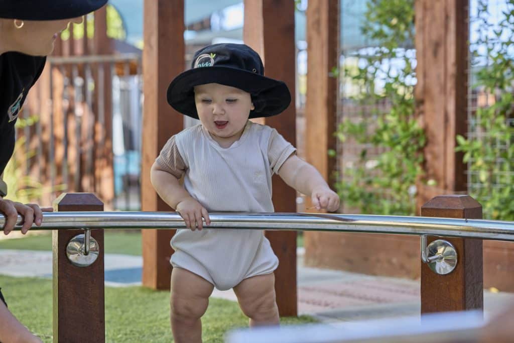 Standing outdoors at Nido Redwood Park childcare